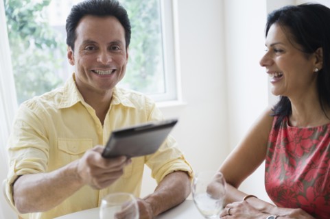 Couple paying check in restaurant