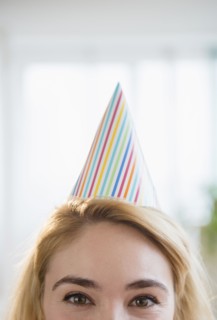 Caucasian woman wearing party hat