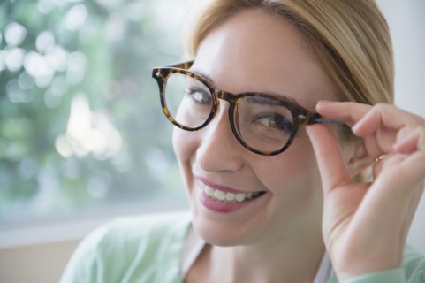Smiling Caucasian woman wearing eyeglasses