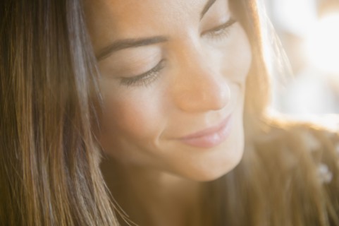 Close up of face of smiling Caucasian woman