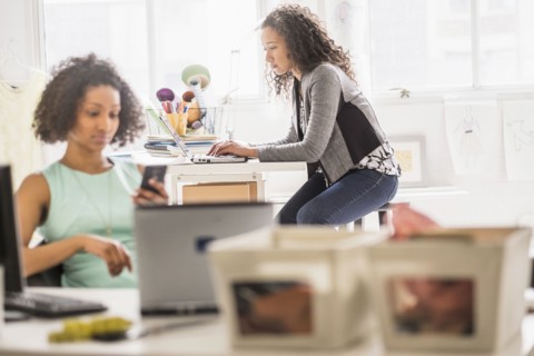 Businesswomen working at desks in office
