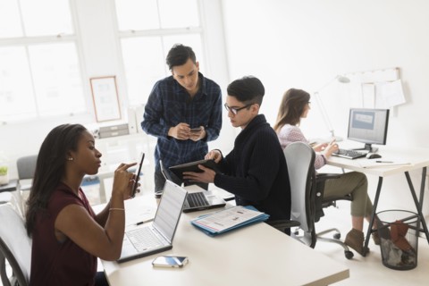 Business people using technology in office