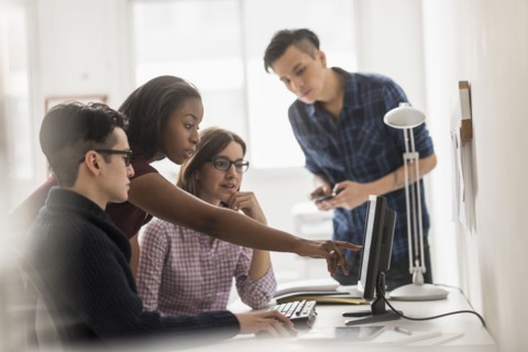 Business people working together at computer