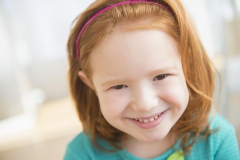 Close up of Caucasian girl smiling