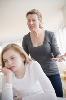 Caucasian mother arguing with daughter