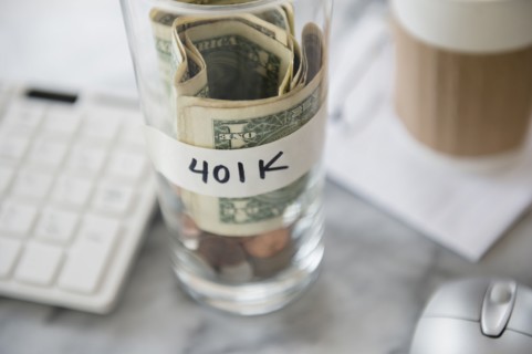 Close up of savings cup on office desk