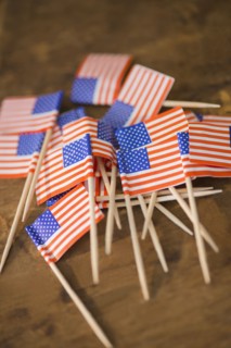Close up of pile of American flags