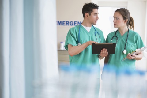 Doctors talking in hospital emergency room
