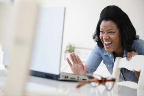 Black woman using laptop