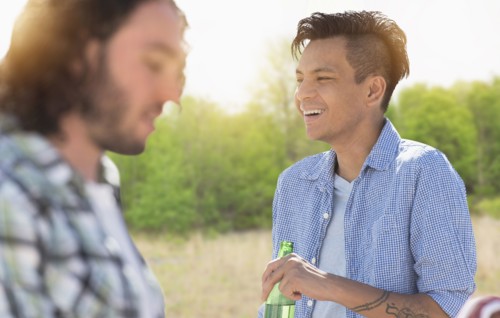 Man drinking beer outdoors