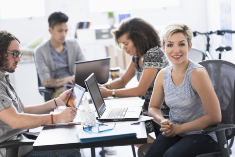 Businesswoman smiling in meeting