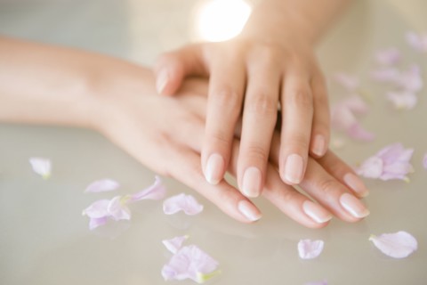 Close up of hands of Hispanic woman