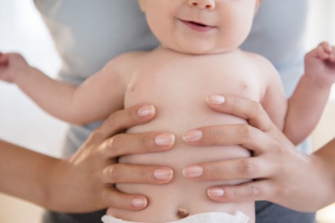 Close up of mother holding baby
