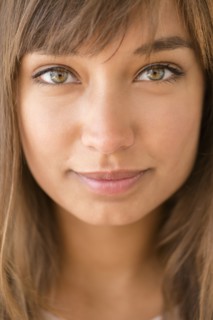 Close up of mixed race woman smiling