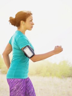 Mixed race woman jogging outdoors