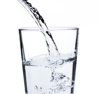 Water pouring into glass