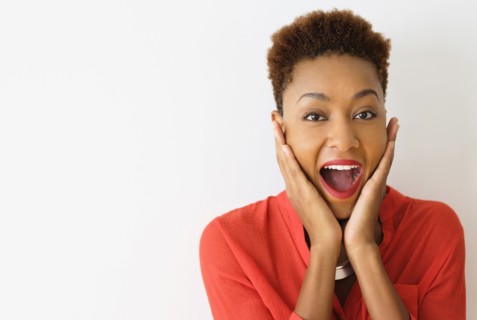 Mixed race woman gasping