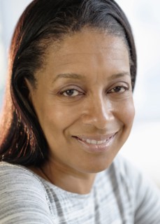 Close up of smiling mixed race woman
