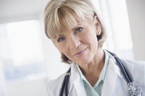 Older Caucasian doctor wearing stethoscope