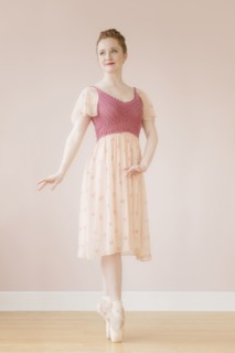 Caucasian ballerina standing en pointe