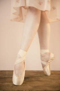 Caucasian ballet dancer standing en pointe