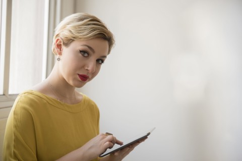Caucasian woman using digital tablet
