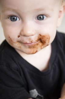 Caucasian baby boy with messy face