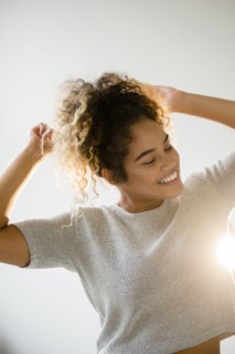 Mixed Race woman dancing