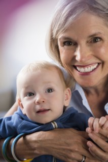 Portrait of smiling Caucasian grandmother and baby grandson