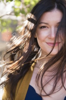 Wind blowing hair of Caucasian woman