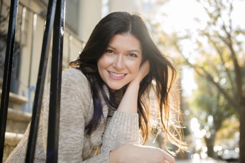 Caucasian woman smiling in city