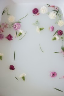 Flowers floating in milk bath