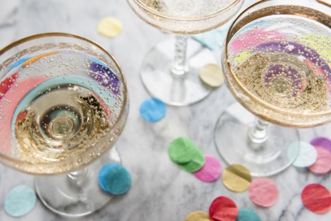 Confetti near glasses of champagne