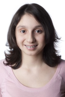 Smiling mixed race teenager in braces