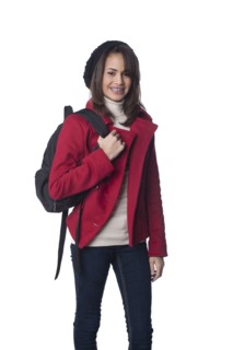 Mixed race teenager carrying backpack