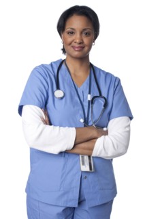 Smiling mixed race doctor with arms crossed