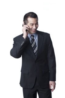 Chinese businessman talking on cell phone