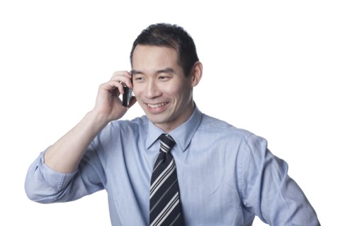 Chinese businessman talking on cell phone