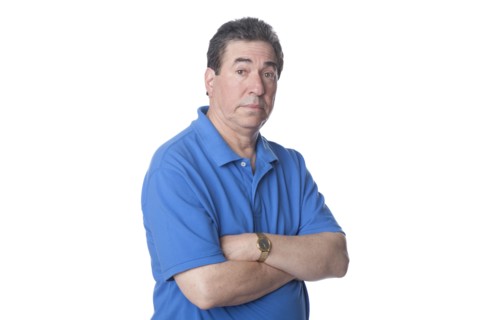 Serious man with arms crossed