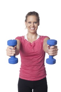 Caucasian woman lifting hand weights