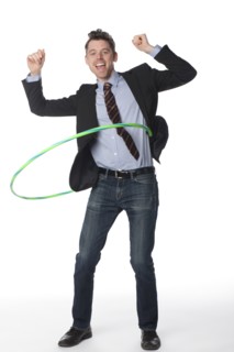 Caucasian businessman twirling plastic hoop