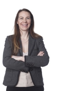 Caucasian businesswoman with arms crossed