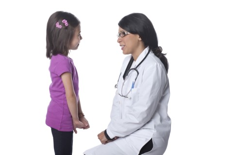 Doctor talking to girl