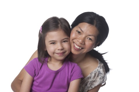 Smiling mother and daughter