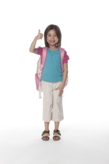 Mixed race girl giving a thumb's up carrying backpack