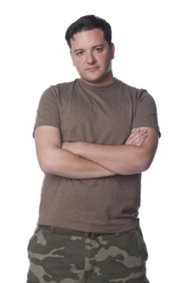 Serious Caucasian man with arms crossed