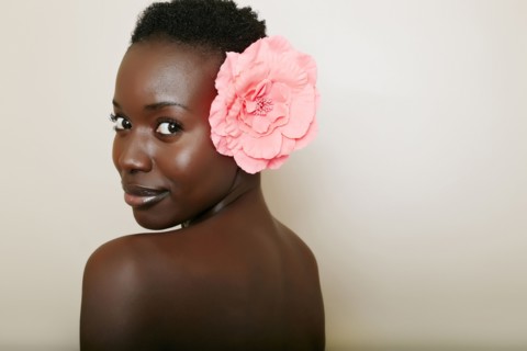 African American woman wearing flower in hair