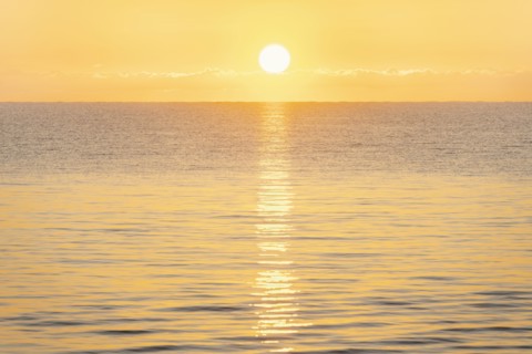Calm sea at sunrise