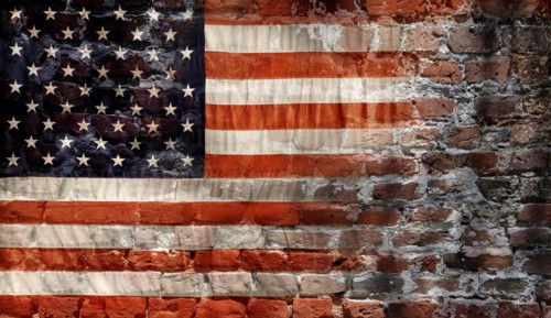 American flag on brick wall