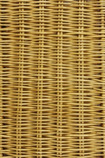 Close-up of closed wicker picnic basket